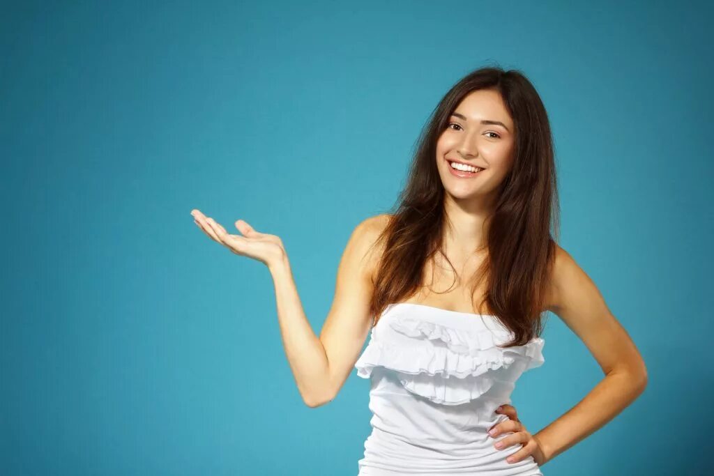 Девушка указывает вниз. People showing something. Show something. Show something. To show something.