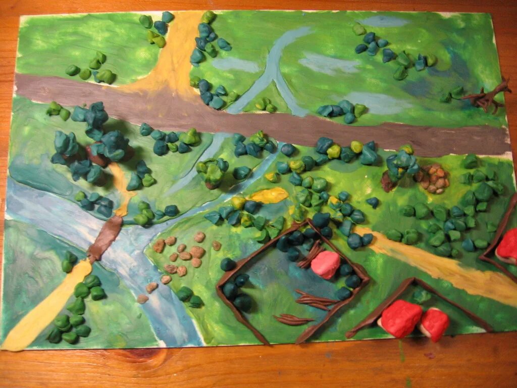 макет рельефа земли. изображения материков для детей. лес из пластилина. поделка на географию. карта пластилина.