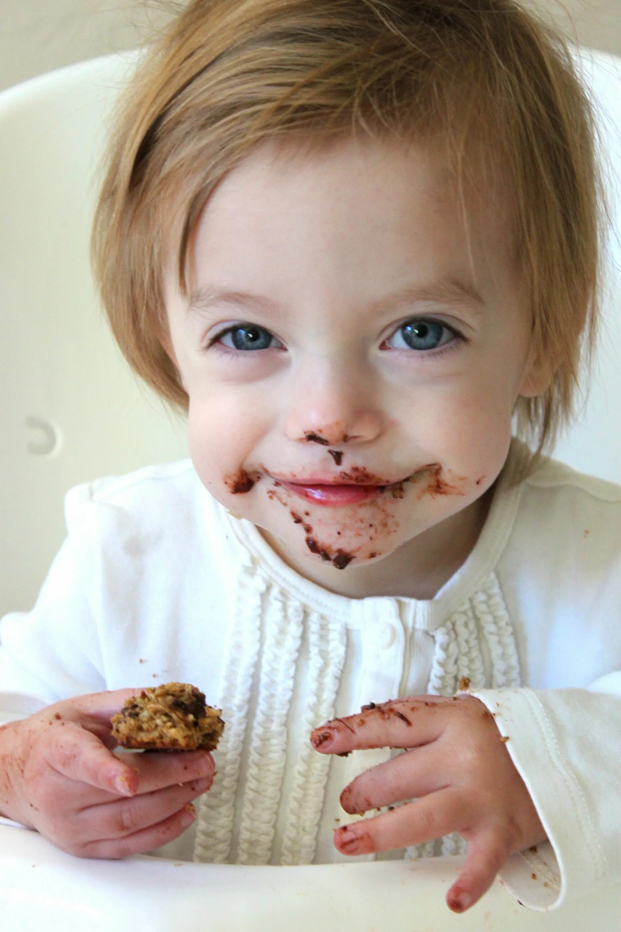 Eating cookies Baby. Grogu eat cookies. Child eating cookies with New Haircut. Baby with a cookie. Eating cookies