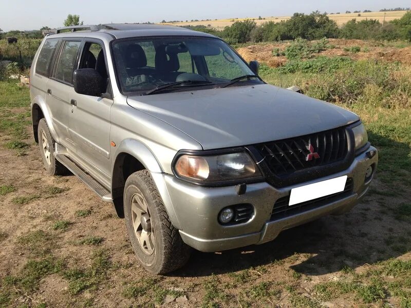 Pajero sport 2002. Mitsubishi pajero sport 1998-2007. Митсубиси паджеро 1998 дизель. Митсубиси монтеро спорт 1998. Митсубиси паджеро 2002.