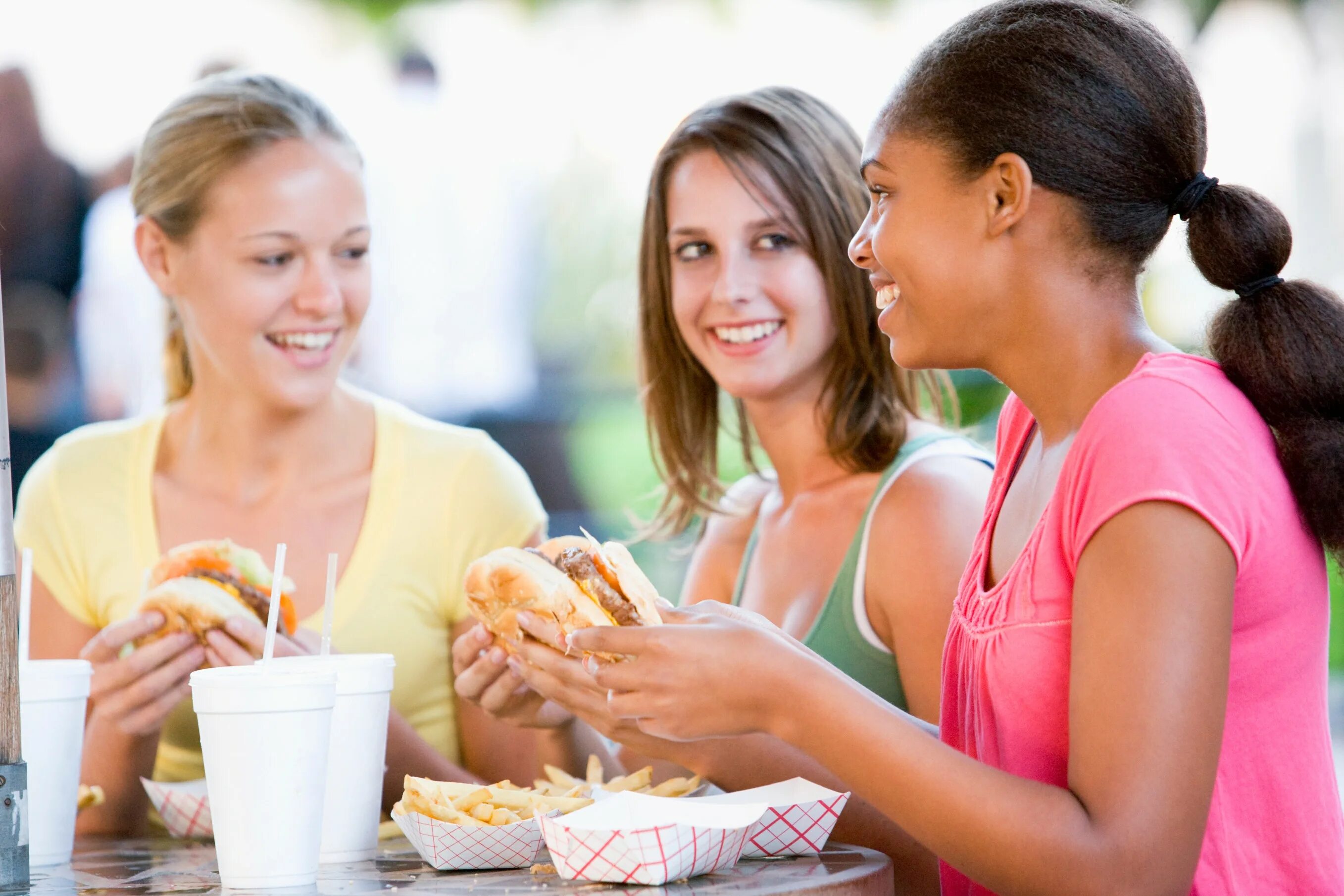 Eating in and eating out. Подросток ест фаст фуд. healthy teenagers. adulthood. eat out.