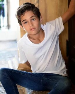 Image may contain: 1 person, sitting. 