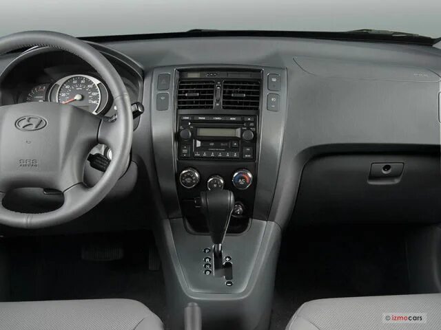 Купить б/у Hyundai Tucson I 2.0 AT (140 л.с.) бензин автомат в Москве: красный Х