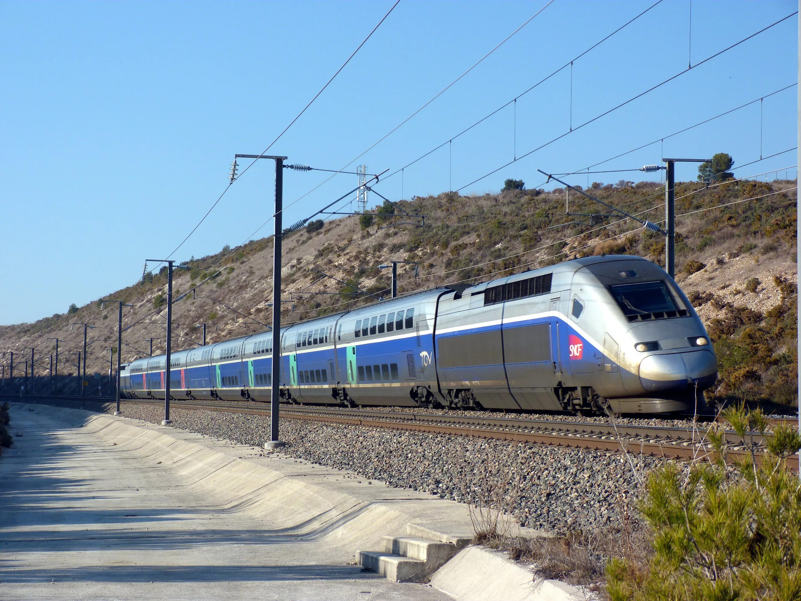 Поезд ТЖВ Франция. Французский поезд TGV. SNCF Франция железная дорога. Скоростной поезд TGV Франция.