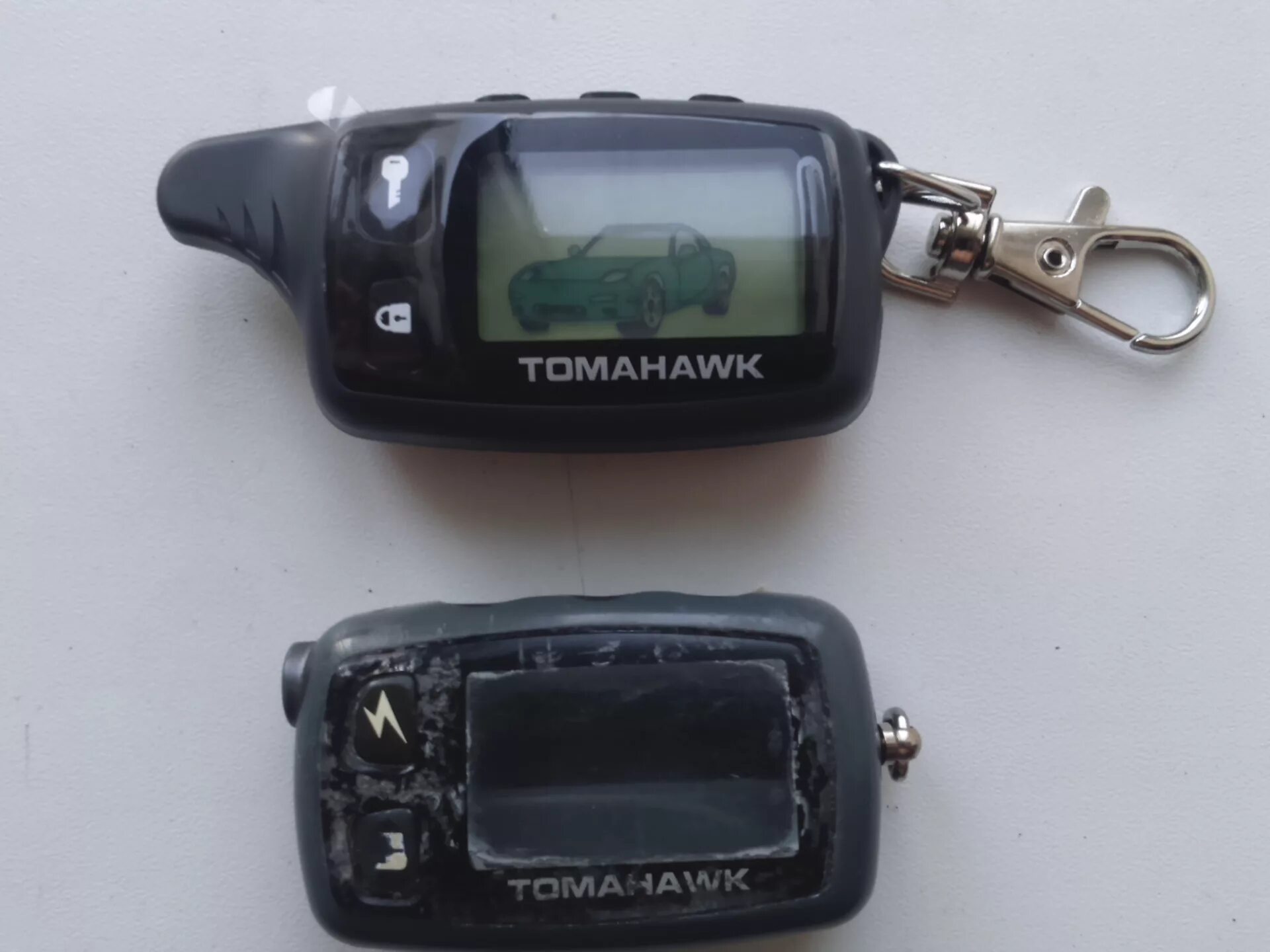 Модели сигнализации томагавк. Tomahawk tw7000 автозапуск. Tomahawk TW-7000. Сигнализация Tomahawk TW 7000. Tomahawk model TW-7000.
