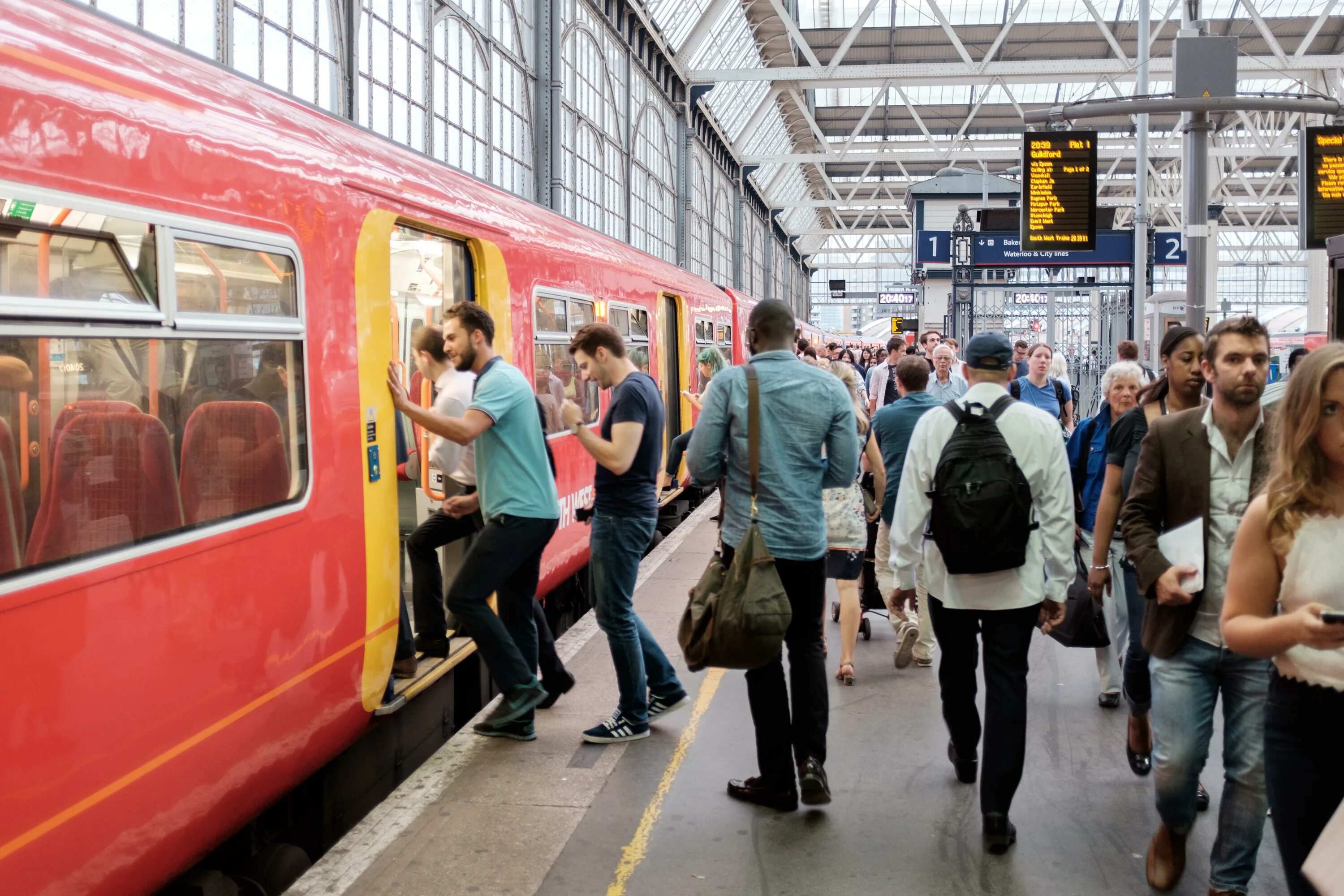 The Station рыжая. At Station или on Station. Train Board. Arrive at Station. We arrive to london