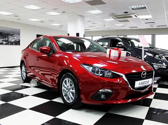 Mazda спб. Мазда 3 2014 1.5 автомат. Мазда 3 в автосалоне. Автосалон новые мазды. Мазда Мазда в автосалоне Мазда.