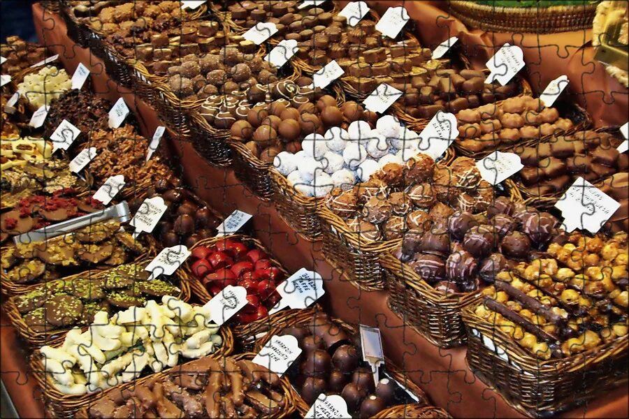 Сладости оптовая. Таррагона шоколад. Рынок сладостей. Шоколадные изделия. Кондитерские изделия на рынке.