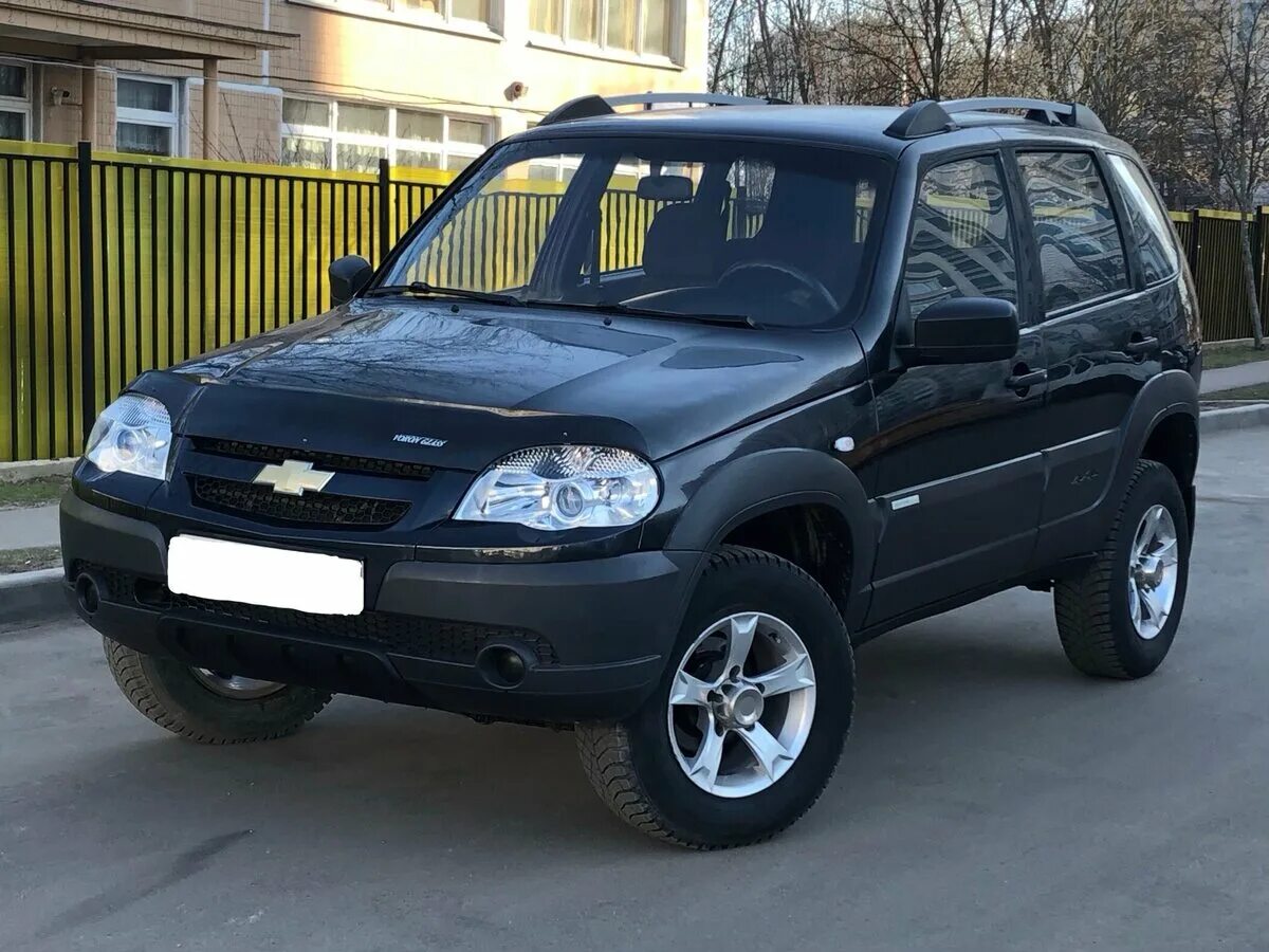 Купить шеви б у. Chevrolet Niva 2013. Шевроле Нива 2013 черный. Шевроле Нива 1 Рестайлинг. Chevrolet Niva 1.7 МТ, 2006,.