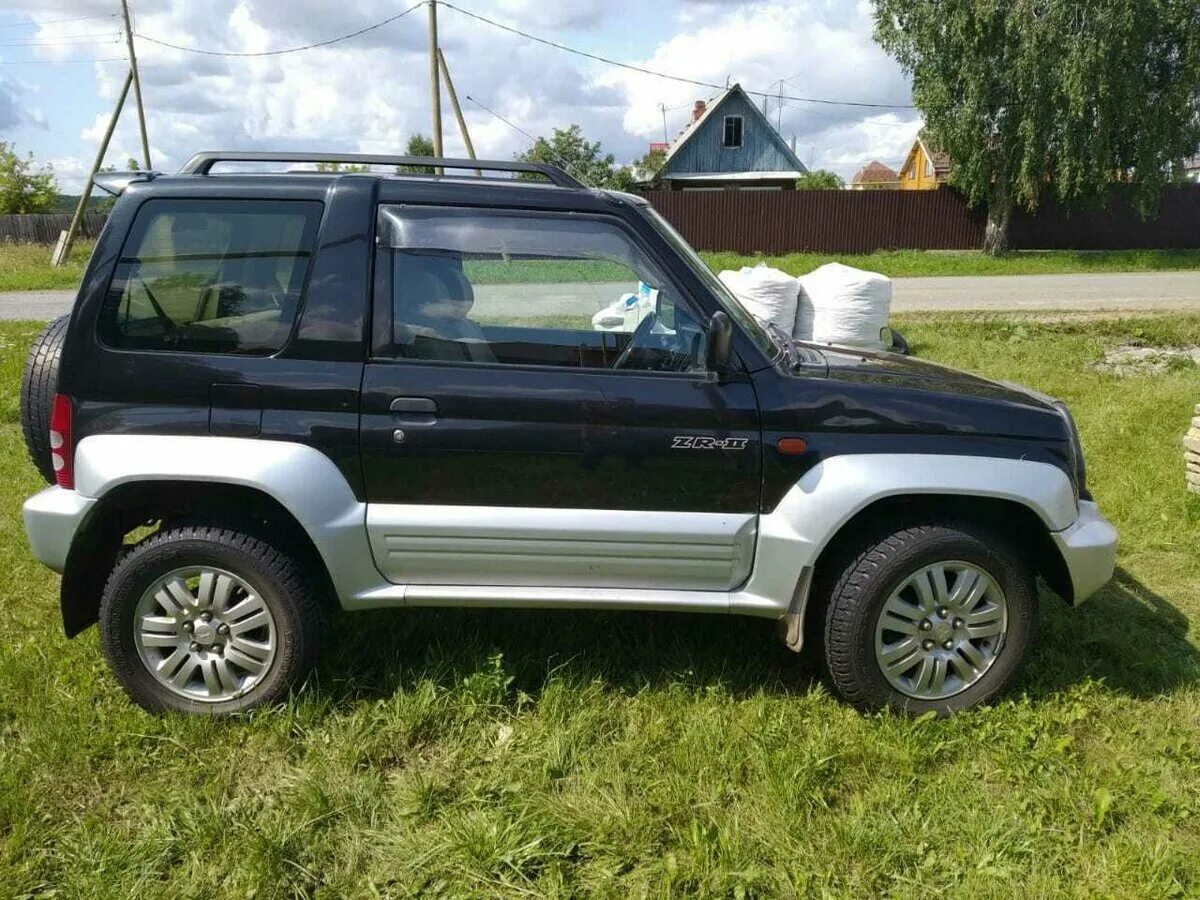 Mitsubishi junior. Mitsubishi Pajero Junior 1995. Mitsubishi Pajero Junior, 1996. Мицубиси Паджеро Джуниор 1996. Мицубиси Паджеро Джуниор 1995.