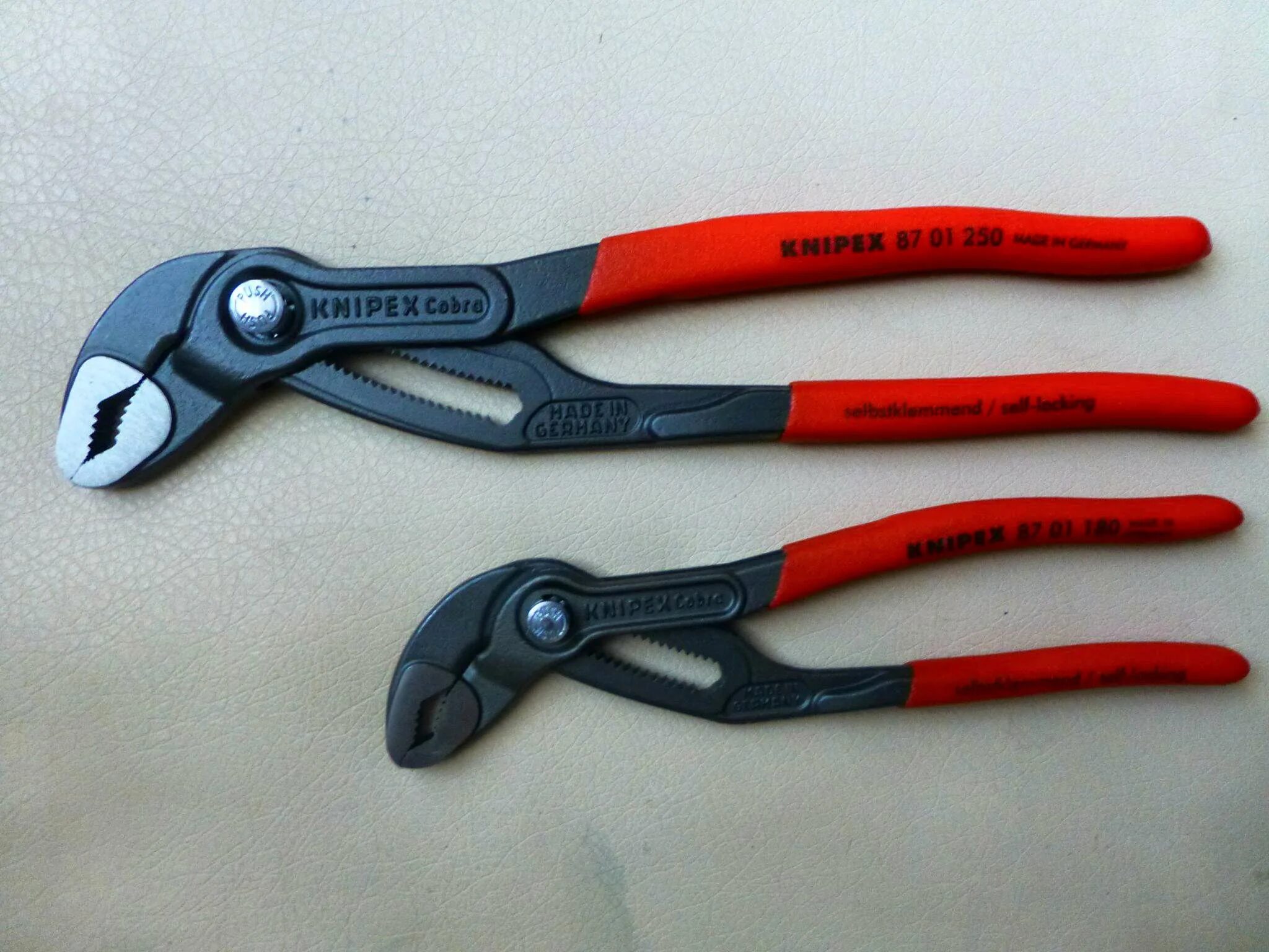 Клещи knipex cobra. Knipex Кобра KN-8702250т. Knipex Cobra KN-8705180. Переставные клещи Кобра Knipex KN-8701150sb аналог. Knipex Кобра KN-8701250.