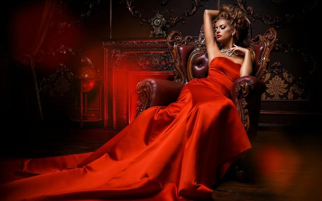 Комната в бордовых тонах. Спальни королевские барокко. Роскошная женщина в вечернем платье. Королевский стиль ампир. Спальня в красном стиле в дворце.