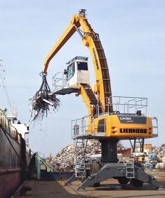 Перегружатель либхер. Liebherr lh50m. перегружатель liebherr lh50. lh 50 liebherr lh50. экскаватор перегружатель либхер.