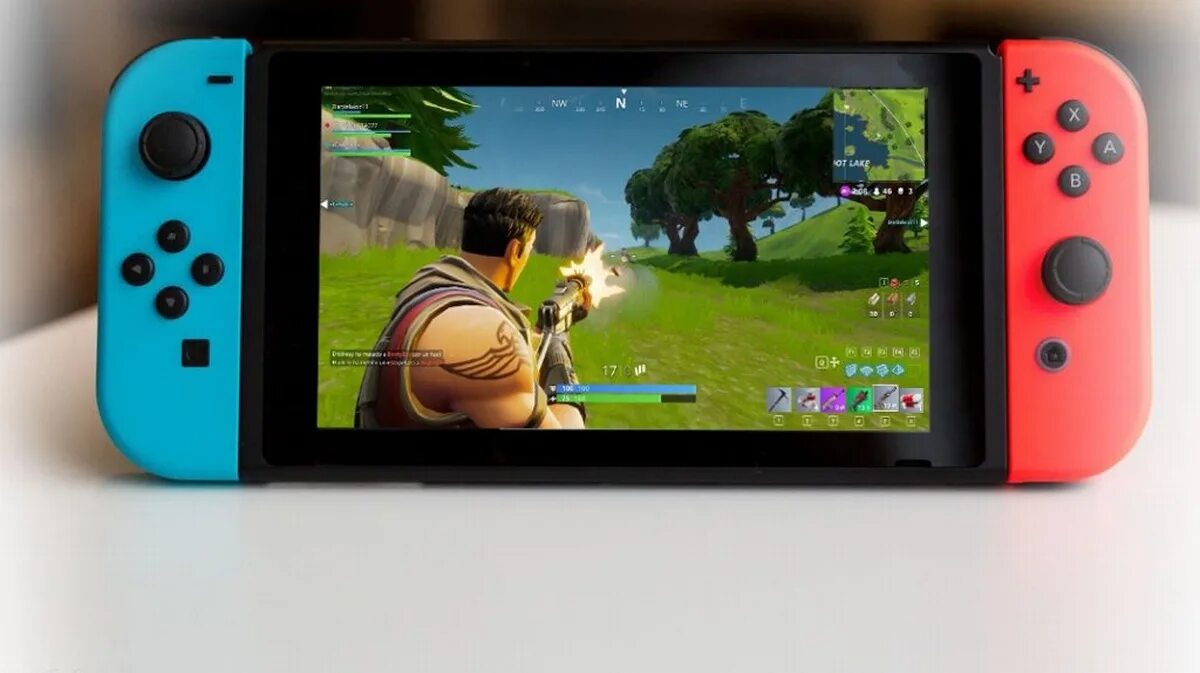 Нинтендо свитч ФОРТНАЙТ. ФОРТНАЙТ Нинтендо свитч геймплей. Nintendo Switch OLED Fortnite. Нинтендо джойконы ФОРТНАЙТ.