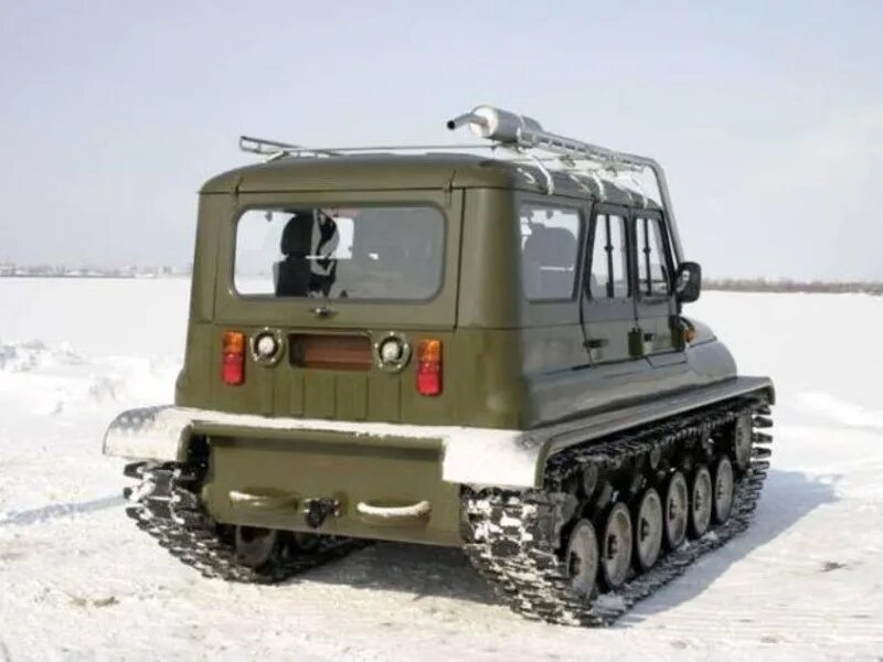 Узола вездеход. Уаз звм-2410 «ухтыш». вездеход-амфибия звм-2410 ухтыш. гусеничный снегоболотоход звм 2410. звм 2410 ухтыш гусеничный плавающий снегоболотоход.