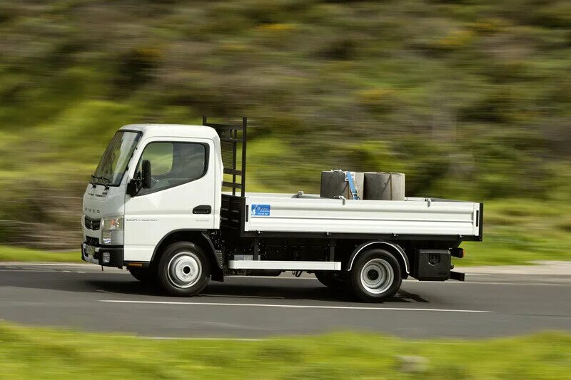Маленькие японские грузовики. Daihatsu hijet, 2002. Японские тягачи fuso. Тойота дюна 4 вд. Тойота грузовичок 4вд.