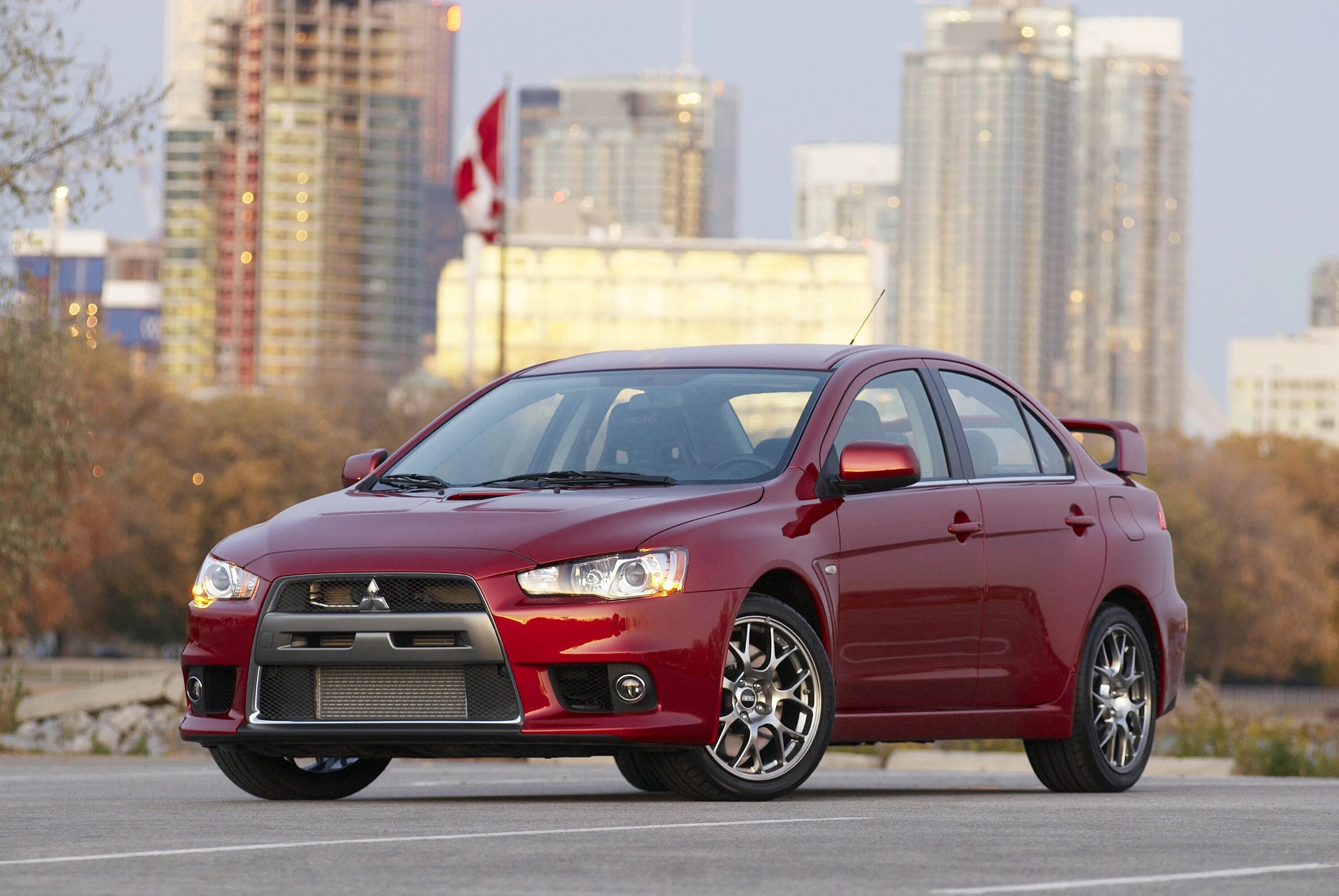 Mitsubishi lancer выпуска. Мицубиси Лансер Эволюшн. Митсубиси Лансер Эволюшн 1. Митсубиси Лансер Эволюшн 2008. Митсубиси Лансер 10.