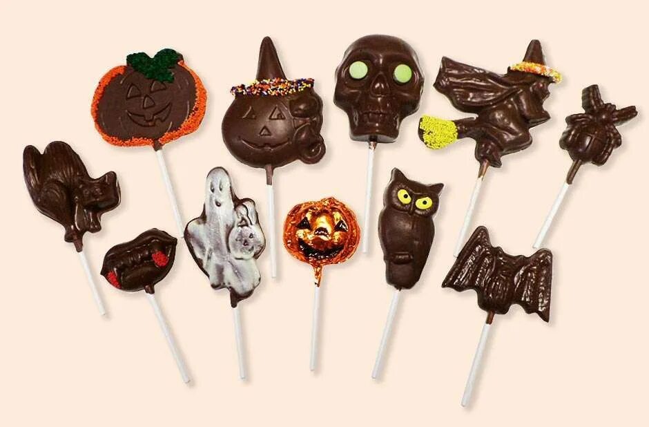 Clicking pops. Шоколадные конфеты Хэллоуин. Хэллоуин сладости конфеты. Леденцы на Хэллоуин. Шоколад на Хэллоуин.