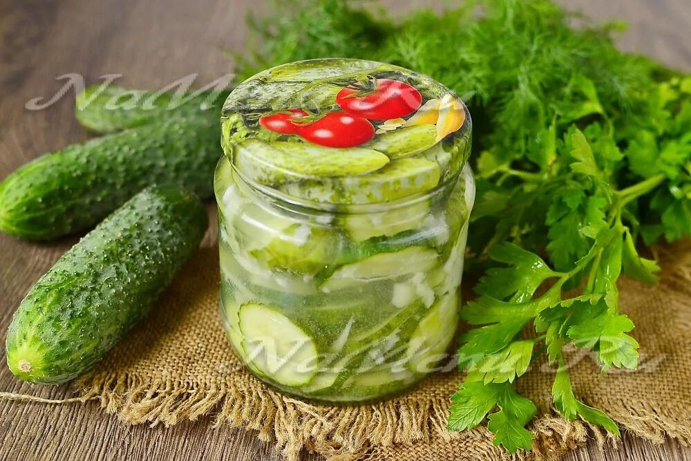 Салат из огурцов на зиму рецепты вкусные. Огурцы пальчики оближешь. Салат из огурцов на зиму. Салат с огурцами на зиму. Огуречный салат на зиму.