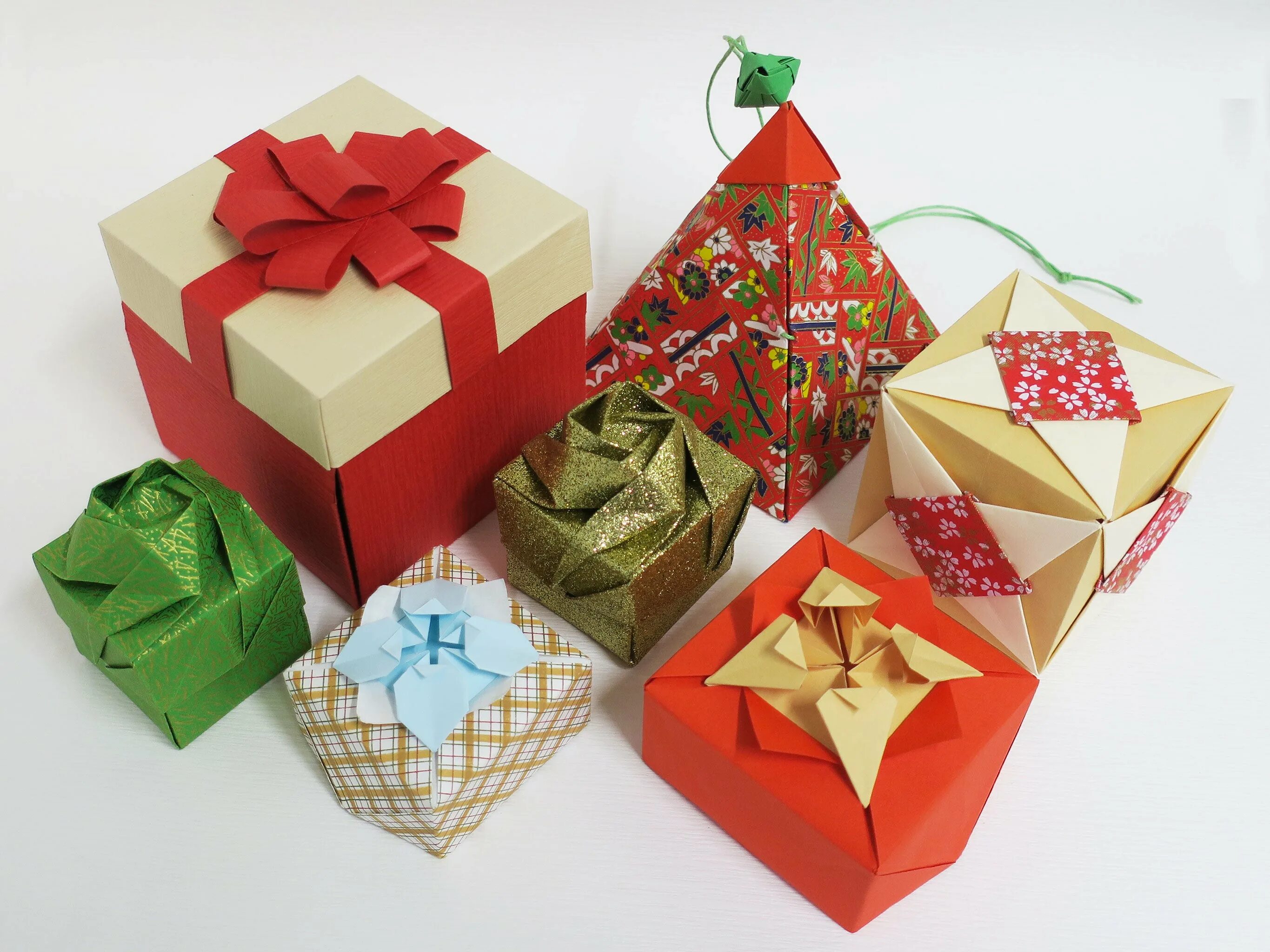 Подарки оригами своими руками. Оригами коробки для подарков. Подарочная коробочка оригами. Необычные подарочные коробки. Красивая упаковка подарков.