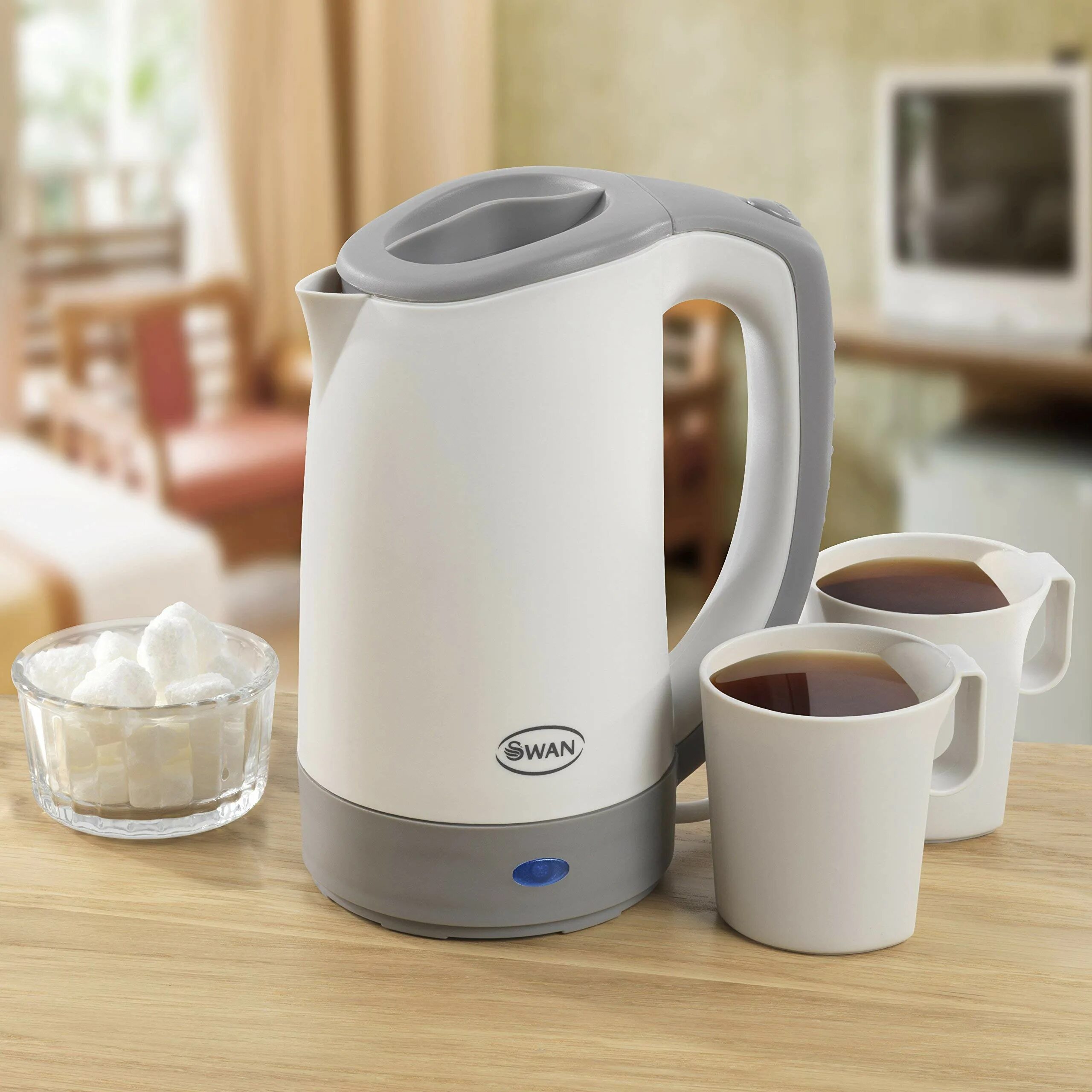 Kettle eu. Электрический чайник Swan sk19020cn. Swan Nordic чайник. Электрочайник на столе. Portable Electric kettle 100ml.