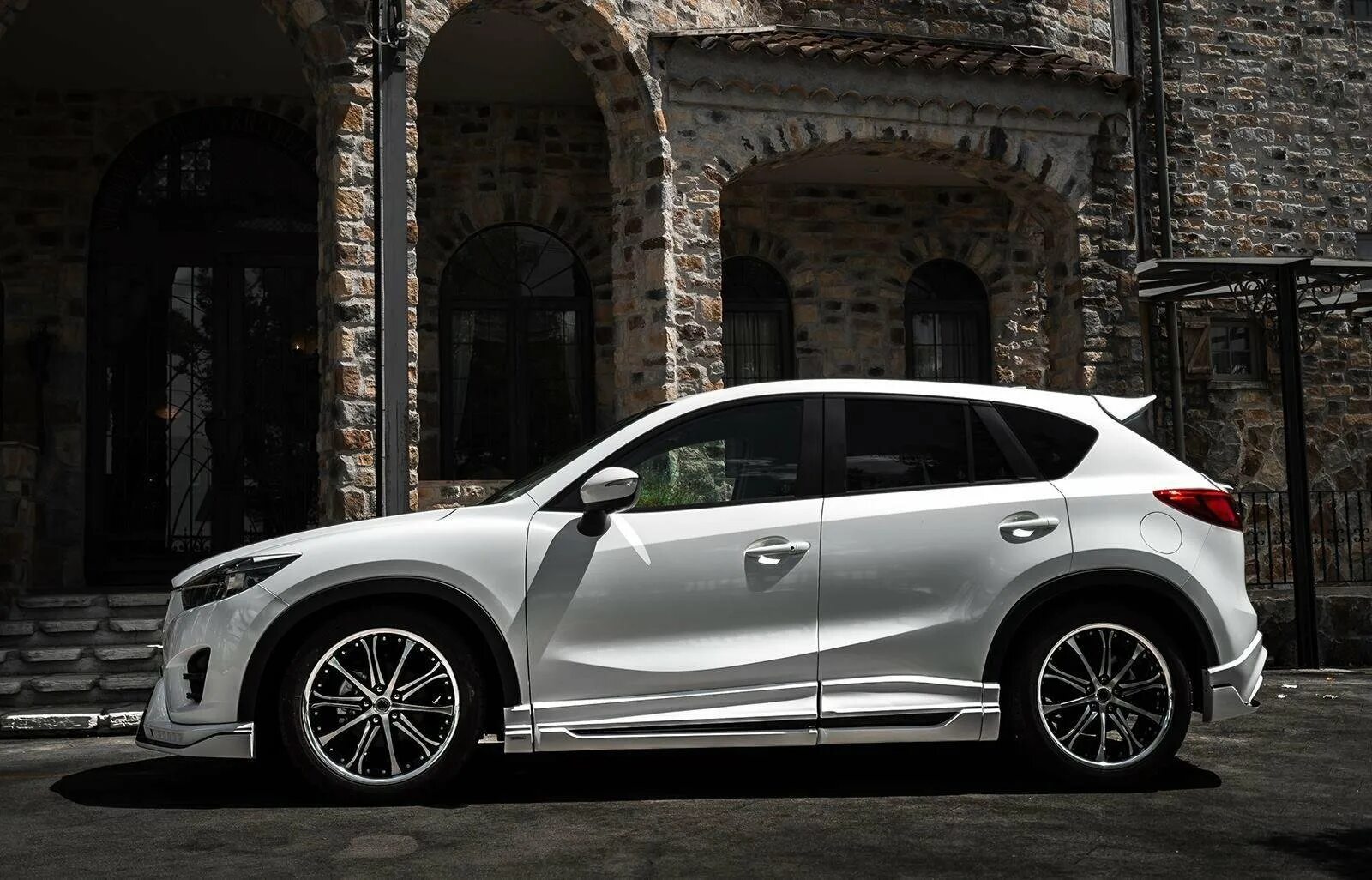 Mazda cx-5 rowen. Mazda cx-5 sema. Обвес на мазду сх 5. Mazda cx 5 tuning. Мазда cx5 в обвесе.