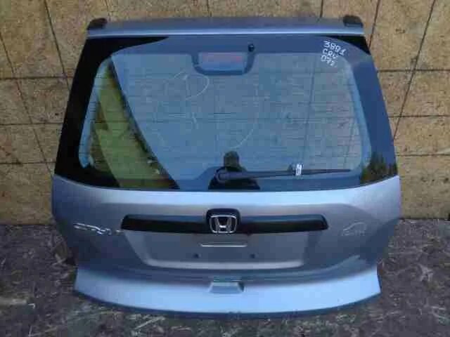 Подставка багажника honda jazz 2007. Хонда крышки багажников. Honda crv крышка багажника. Хонда крышки багажников. Хонда крышки багажников.