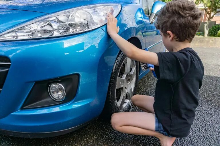 Boy car Wash. Boys washing car. The process of the washing car. Kilian boy washing car. Boys washing