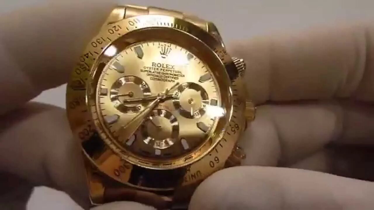 Часы ролекс оригинал отличить. Часы физрука Rolex Daytona. Ролекс Daytona Gold.