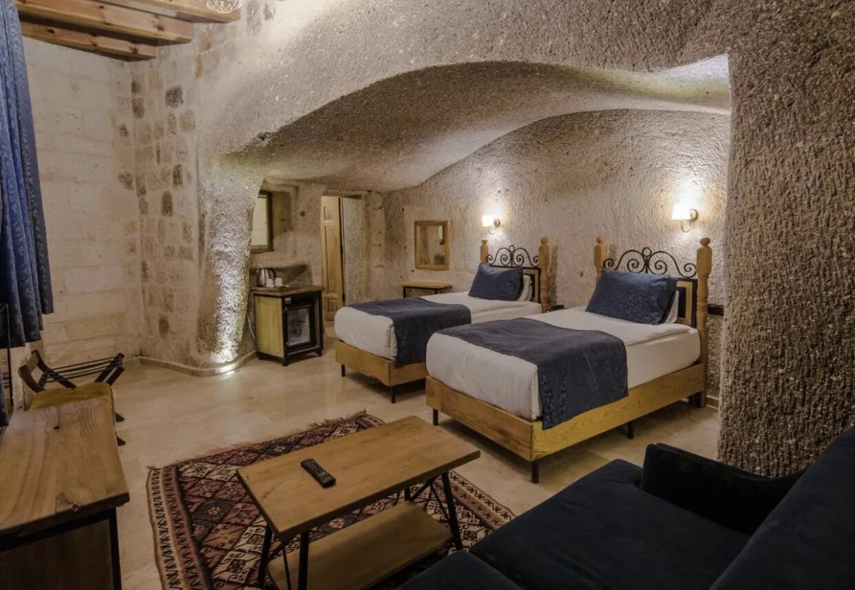 Комната в заре. Lunar Cappadocia Hotel. Каппадокия отели интерьер. Мелек Каве отель Каппадокия. Zara Cave Hotel.