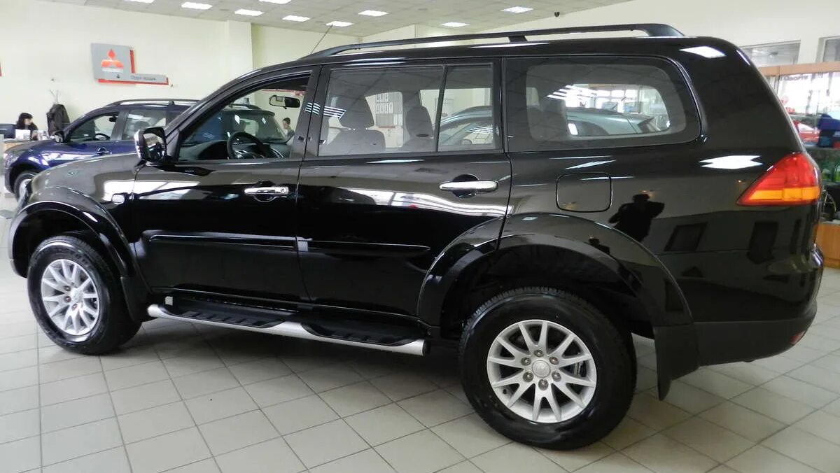 Mitsubishi Pajero Sport черный 2012. Pajero Sport 2012. Митсубиши Паджеро спорт 2012. Mitsubishi Паджеро спорт 2012. Mitsubishi pajero 2012 год