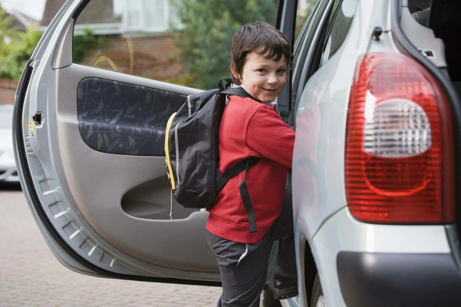 He got of the car. Get into a car. Child in the back of the car. Go to School by car. Going to School in a car.