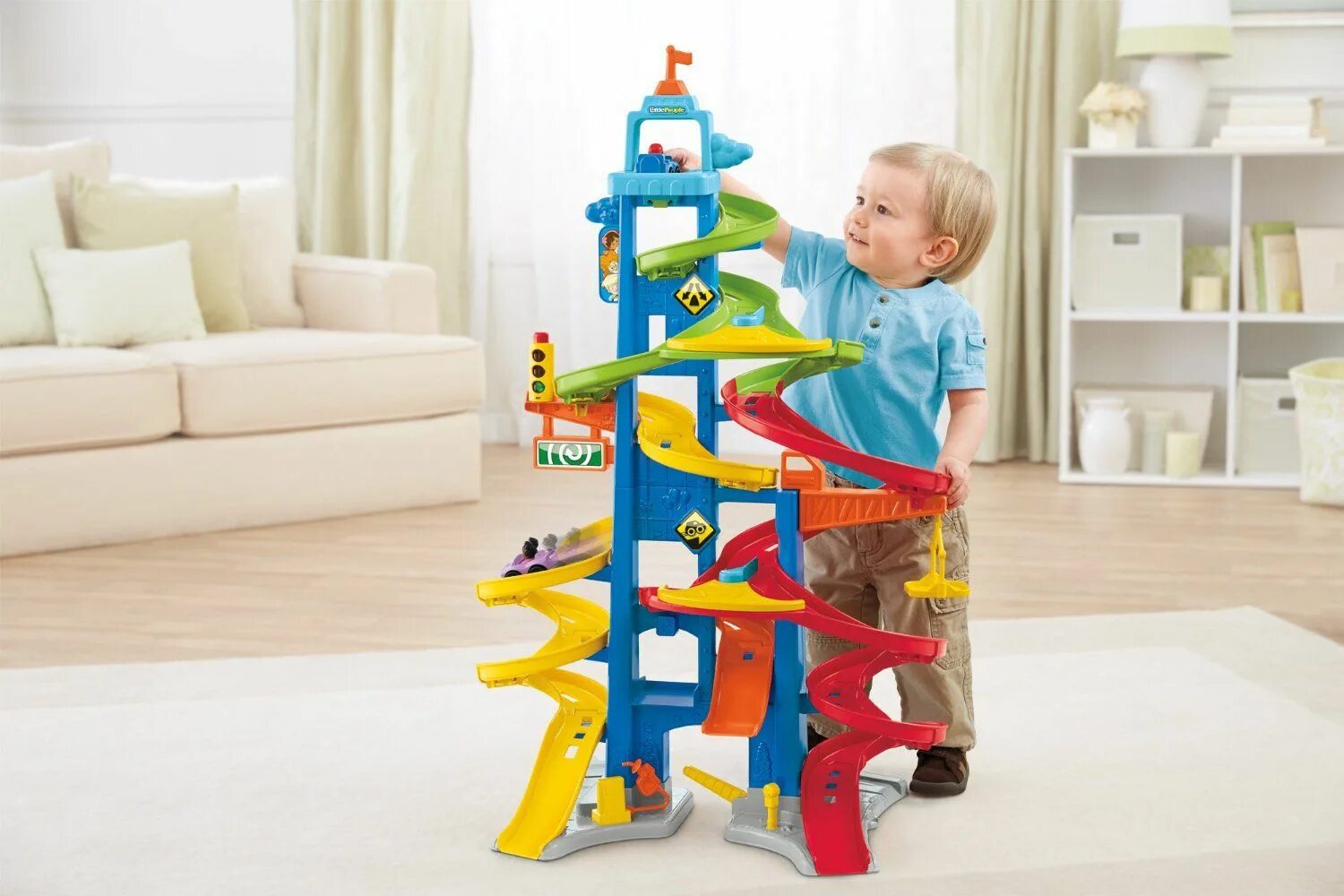 Что подарить ребенку на 2 года мальчик. Трек Fisher Price «небоскреб 2 в 1». Трек Fisher-Price little people небоскреб. Игрушки для мальчиков 2 года. Игрушки для детей 3 лет мальчики.