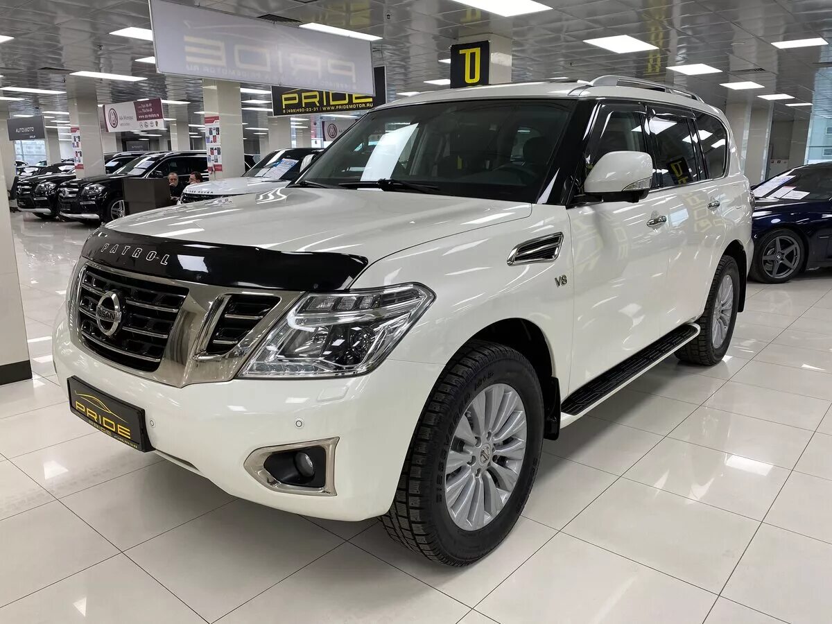 Ниссан патрол 2014. Nissan Patrol vi (y62). Ниссан Патрол 2014 белый. Ниссан Патрол Рестайлинг 2014. Patrol y62 Рестайлинг 2021.