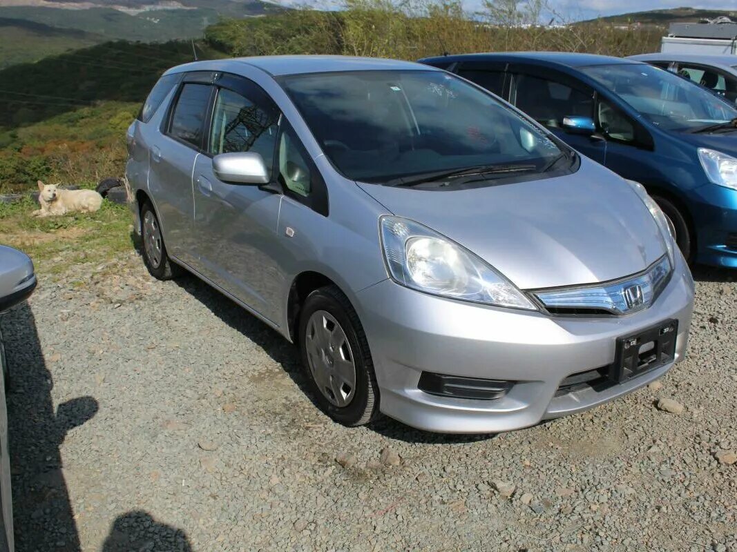 Фит 2012 год. Honda Fit Hybrid 2012. Хонда фит гибрид 2012. Honda Fit II Hybrid, 2013. Honda Fit 1.3 2012 гибрид.