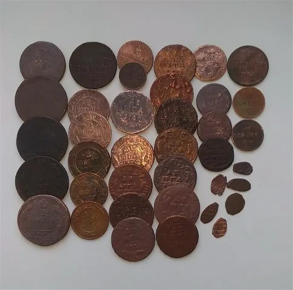 собирай монеты медные. латунные монеты. старинные монеты по 1000000. собирай монеты медные. медные монеты.