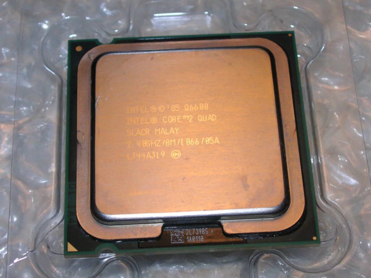 Интел 775. Процессор Intel Core 2 Quad q6600. Процессор: Intel Core 2 q6600. Процессор: Intel Core 2 Quad CPU q6600. Core 2 Quad q6600 Box.