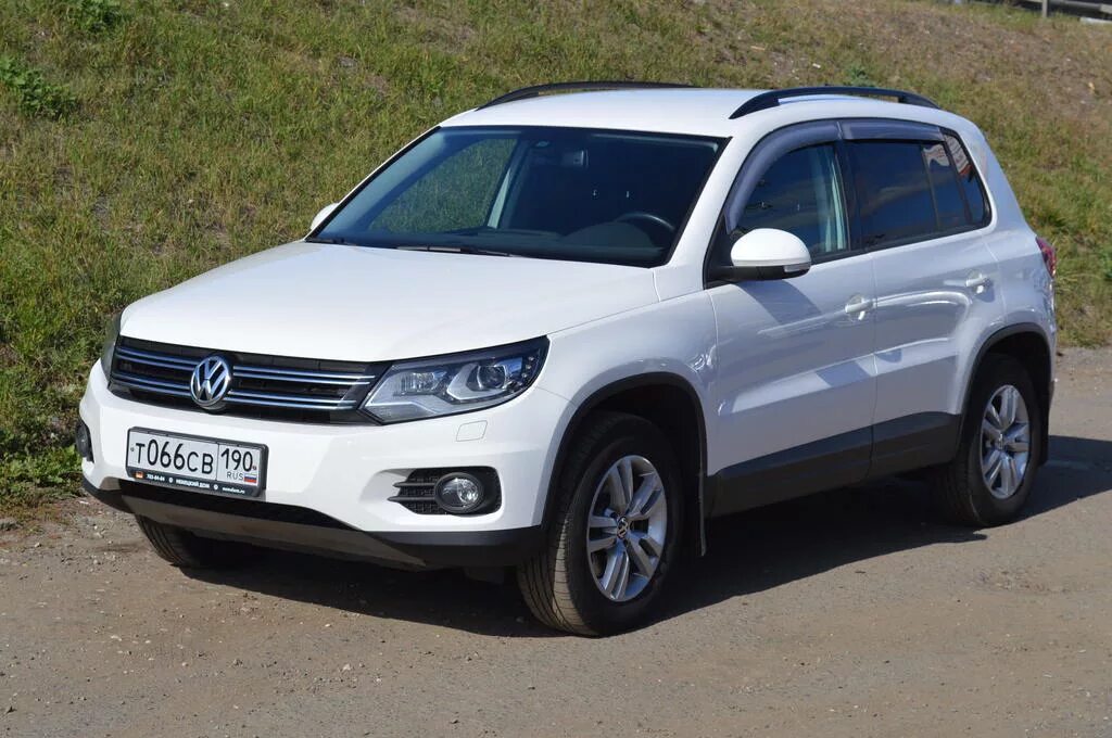 Отзывы тигуан 2.0 автомат. Vw tiguan track and field. vw tiguan 2011 2.0. vw tiguan 2012 track field. tiguan track and field 2011.