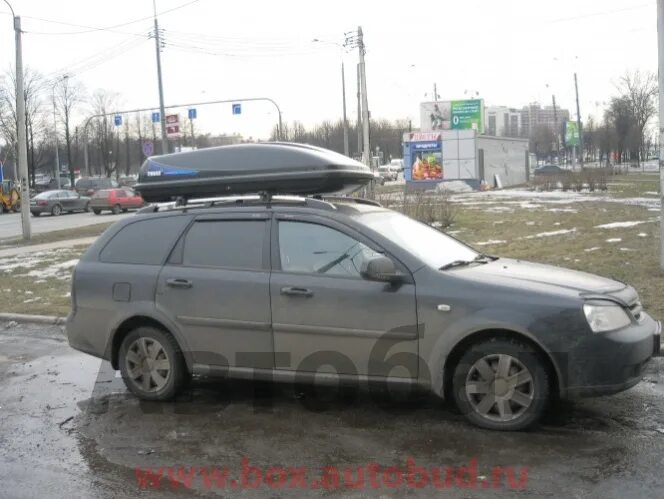 Багажник на шевроле лачетти универсал. Багажник Thule Chevrolet Lacetti 2010. Багажник на крышу Chevrolet Lacetti. Рейлинги на Шевроле Лачетти. Chevrolet Lacetti, 2005 багажник на крышу.