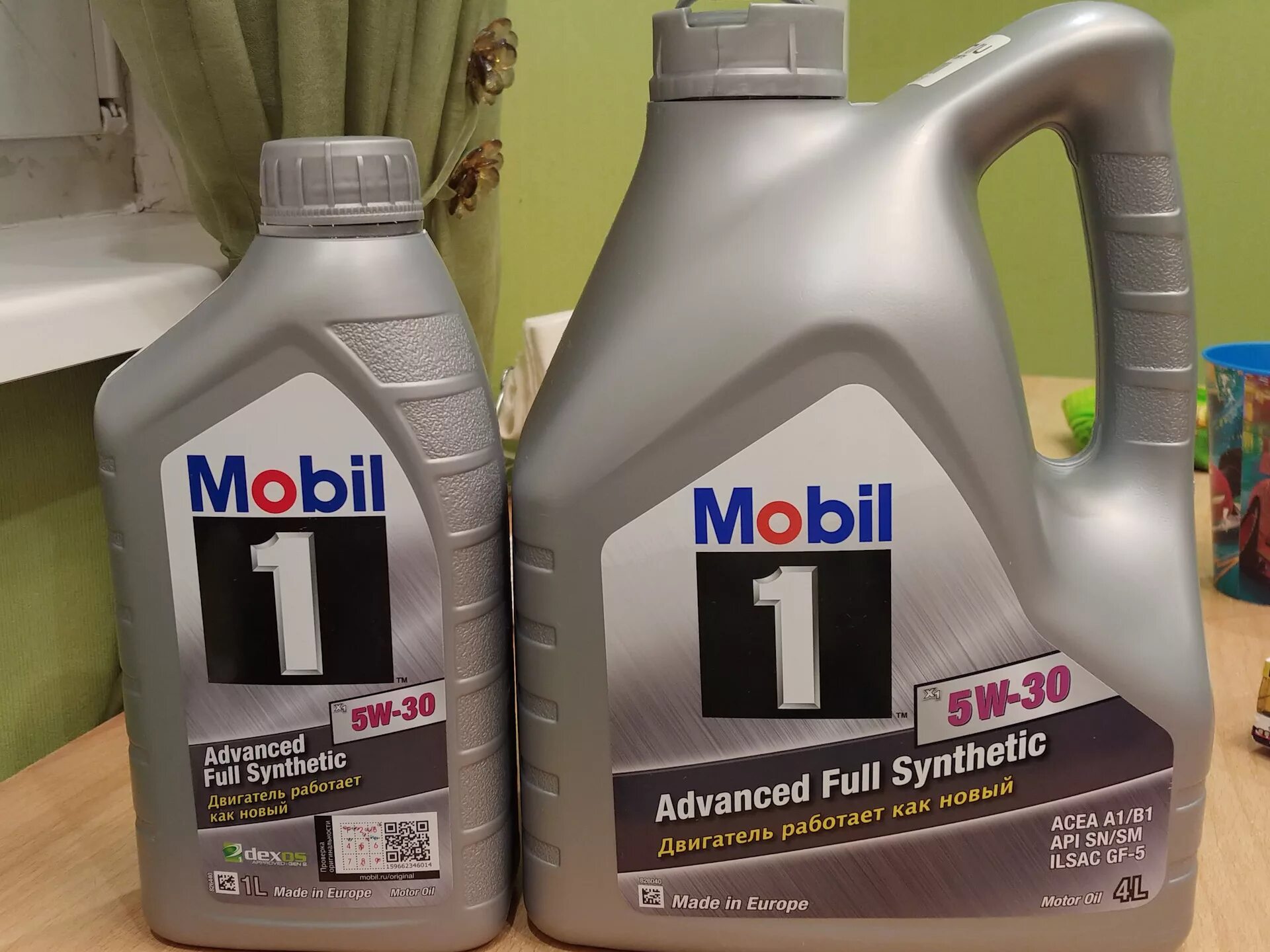 150012 mobil 1л новая канистра. масло мобил1 х 5w30. 10w 40 mobil 1 full synthetic 1 lt. защита от подделок на канистрах масло mobil. мобил 1 5w30 зеленая канистра.