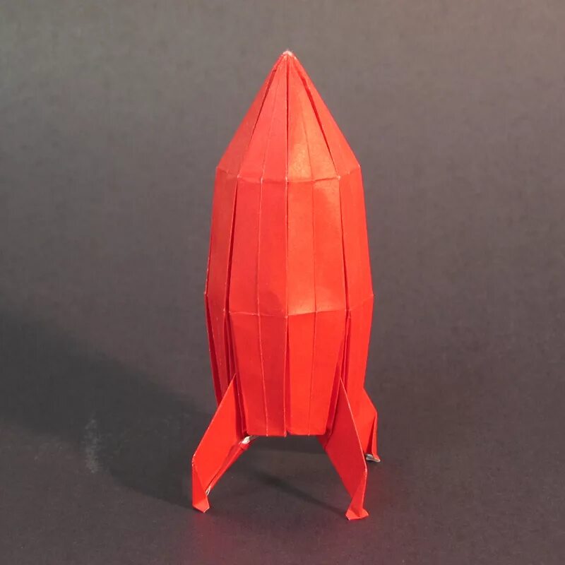 Модульное оригами ракета. Оригами ракета летающая ракета. Космическая ракета оригами. Оригами космич ракета. Поделка ракета из бумаги оригами.