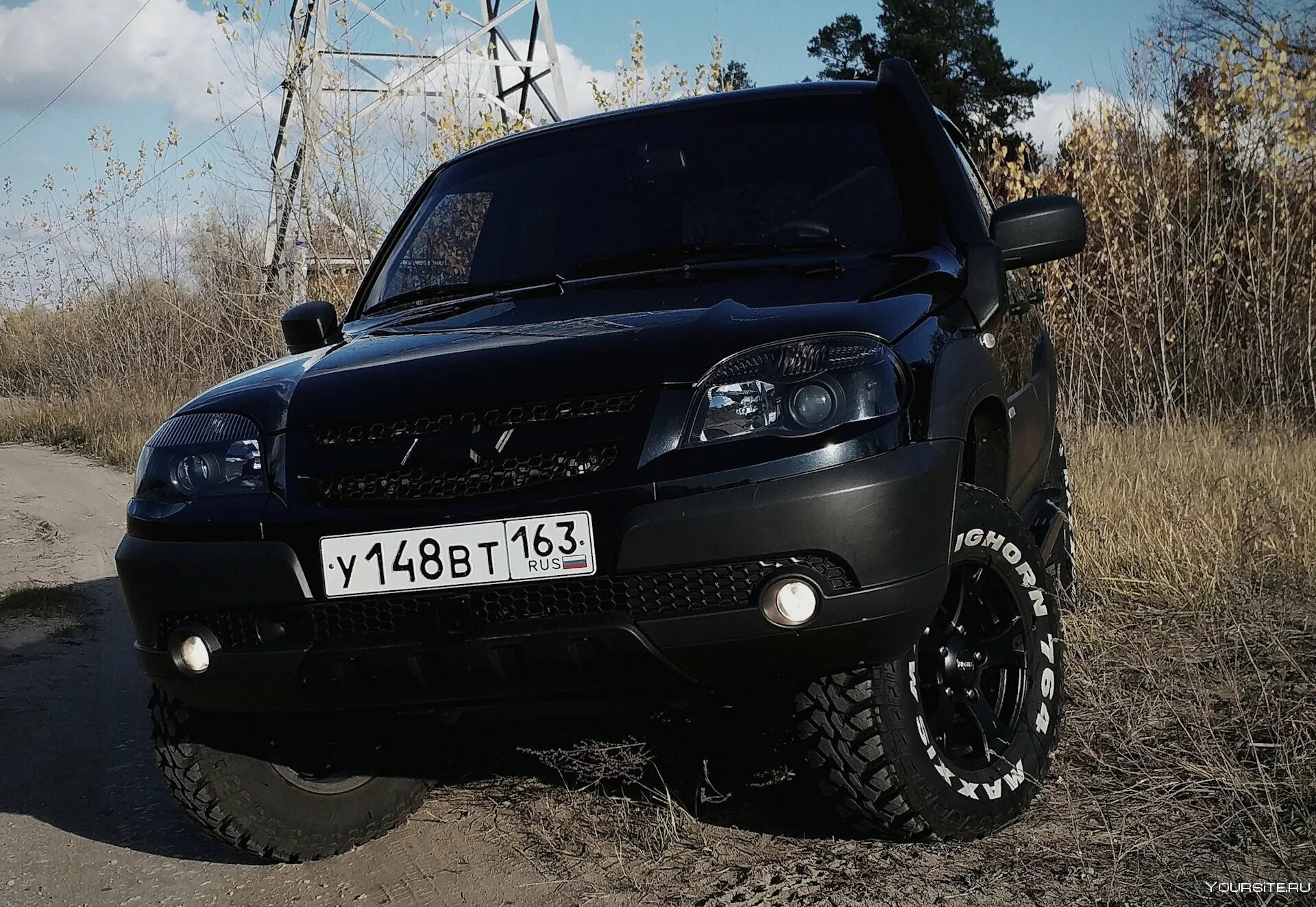 Тюнинг шевроле нива купить. Chevrolet Niva Tuning. Нива Шевроле черная. Chevrolet Niva черная. Тюнинговая Нива Шевроле.