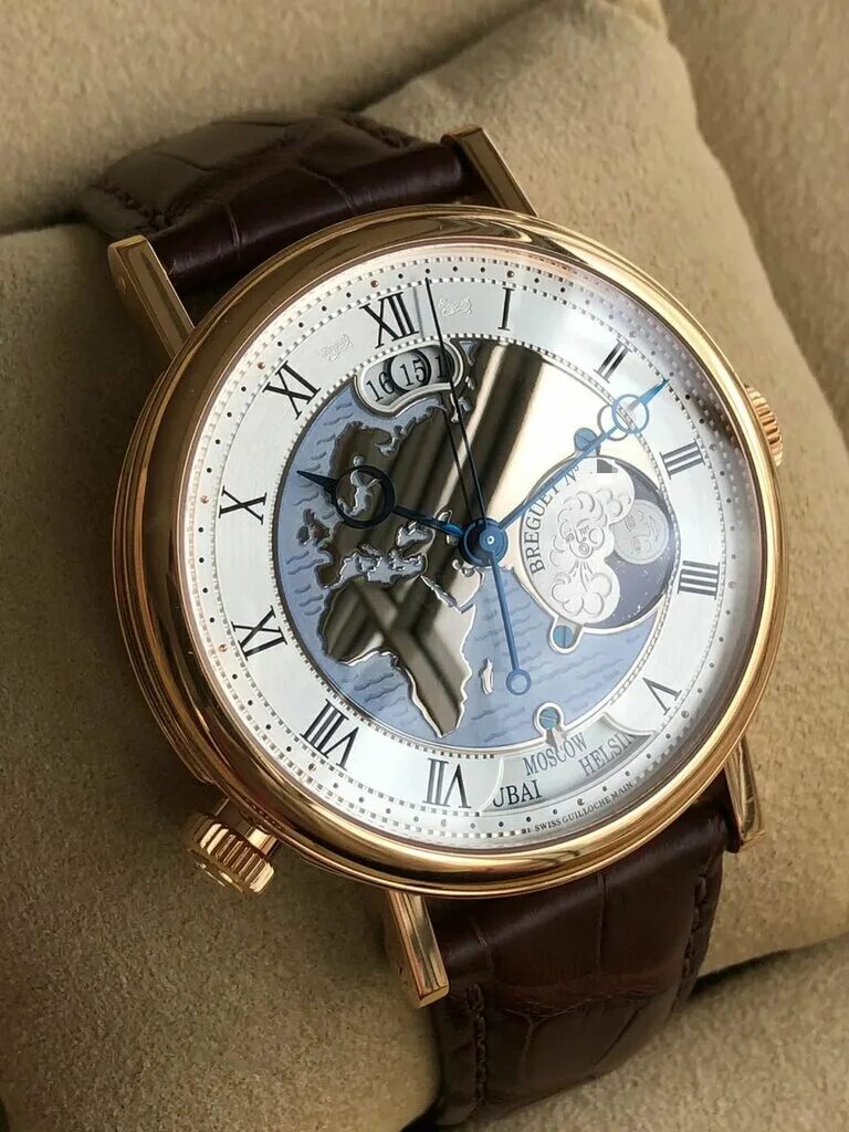 Часовой ломбард швейцарские часы. Часы Breguet hora Mundi. Breguet 5717. Ломбард часы. Breguet Marin hora Mundi золотой браслет.
