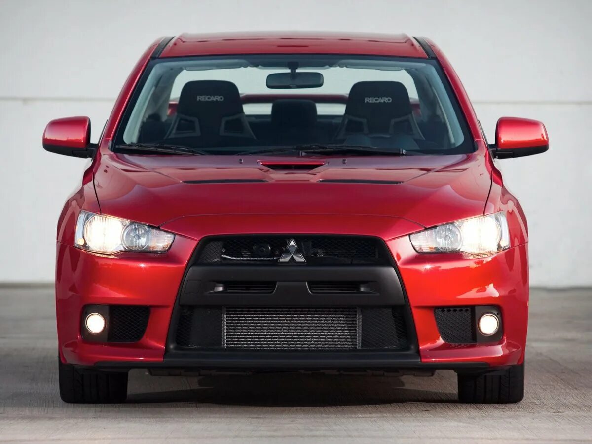 Mitsubishi Lancer Evolution 12. Mitsubishi Lancer Evolution 10. Мицубиси Лансер x10. Митсубиси Лансер Эволюшн 2010.