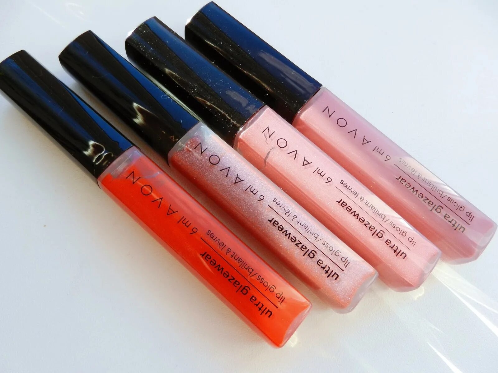 Блеск avon. Shimmered Avon блеск. Эйвон блеск для губ Lip Gloss. Блеск для губ нюд эйвон. Блеск для губ ультрасияющий Crystal Lilac.