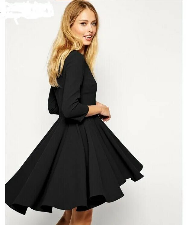 черное приталенное платье. черное приталенное платье. расклешенное платье без рукавов. платье по колено с пышной юбкой. черное платье мини с пышной юбкой.