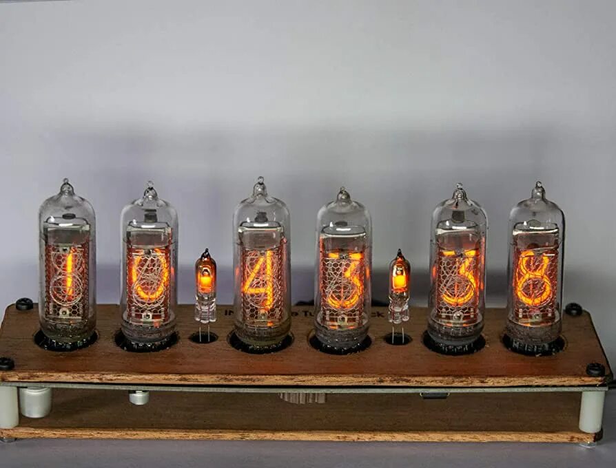Часы на гри и arduino v2. Трубка nixie. Nixie world hotel. Nixie clock font. Millclock.