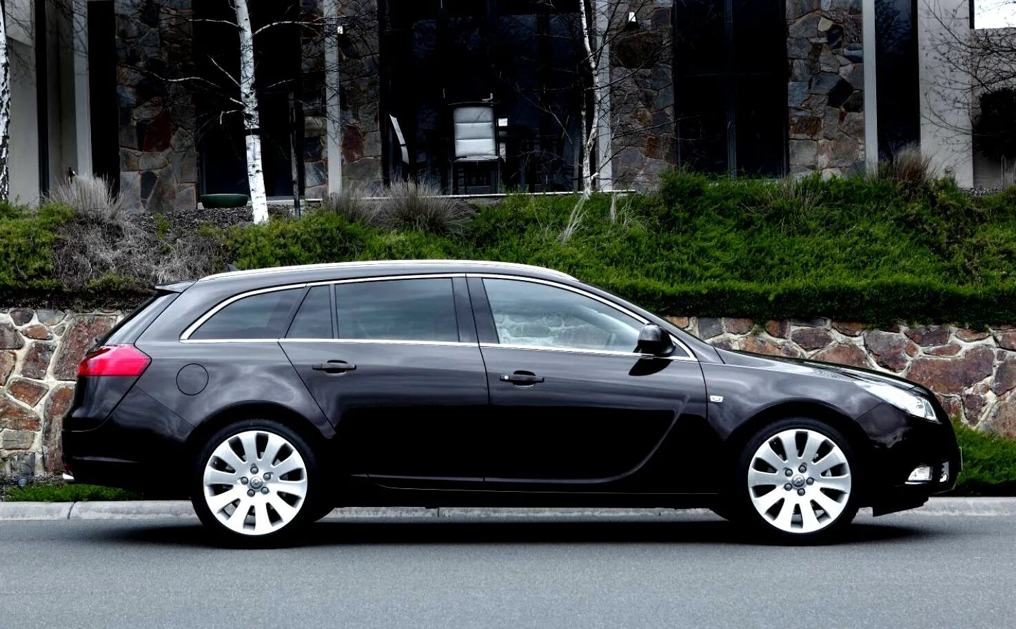 Инсигния универсал. 2009 Opel Insignia Sports Tourer. Opel Insignia Sports Tourer 2012. Opel Insignia 2012 универсал. Insignia Sports Tourer 2009.