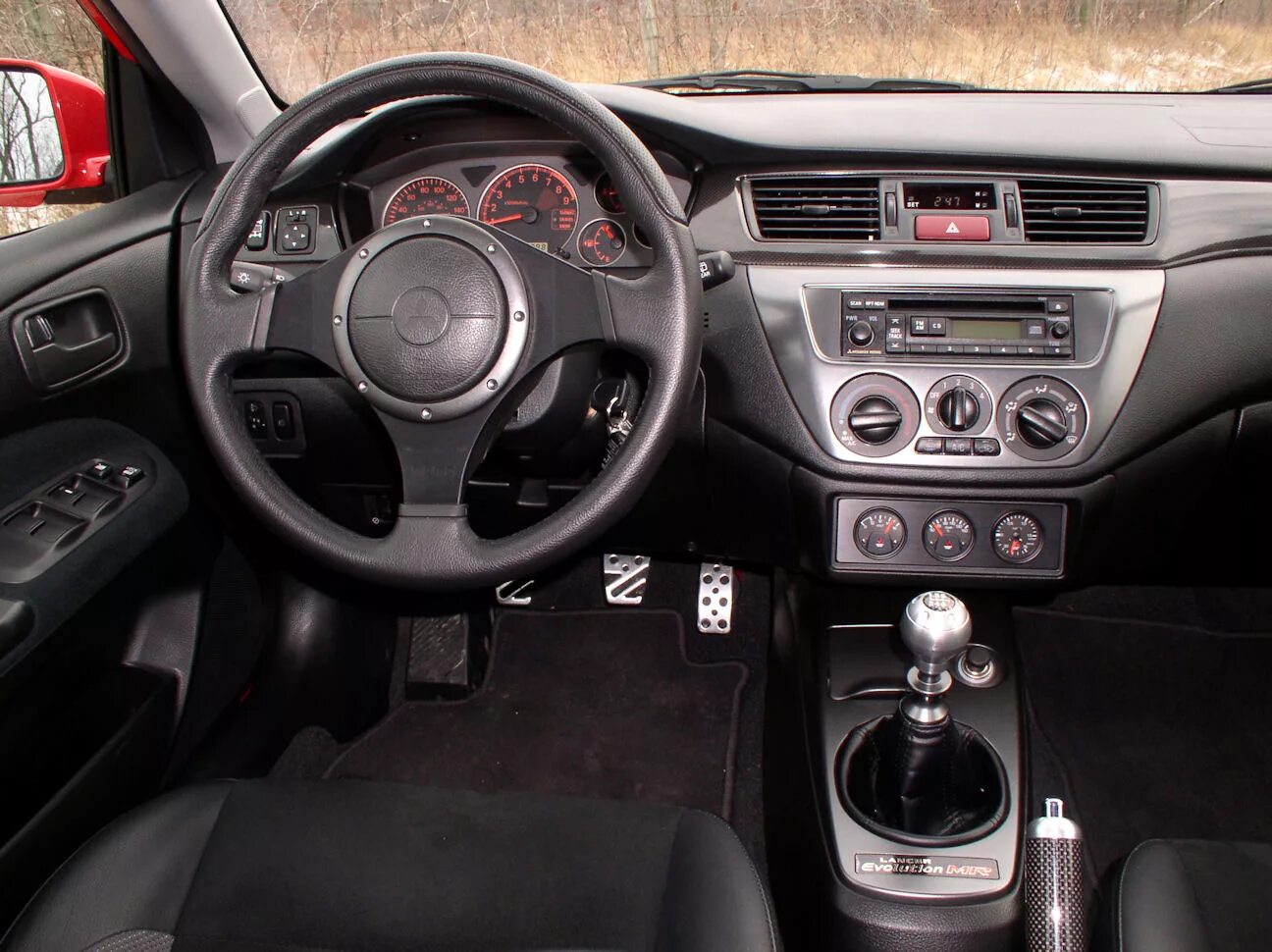 Салон эволюшн. Mitsubishi evo 10 салон. Мицубиси лансер эво 9 салон. Mitsubishi evo 10 салон. Митсубиси эволюшн 9 салон.