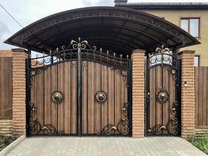 Ворота для частного дома с ковкой